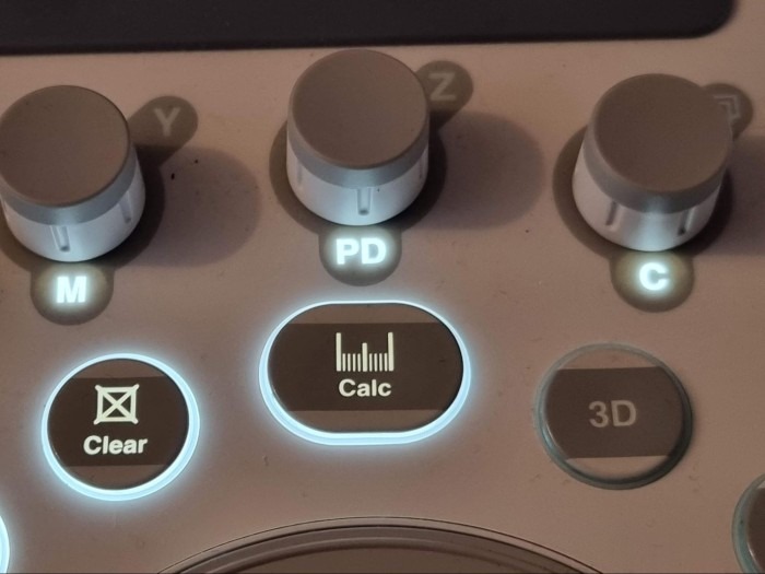 Measurement button on an ultrasound machine.
